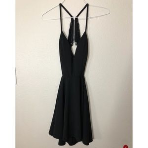 Tight black open back dress! Never worn!